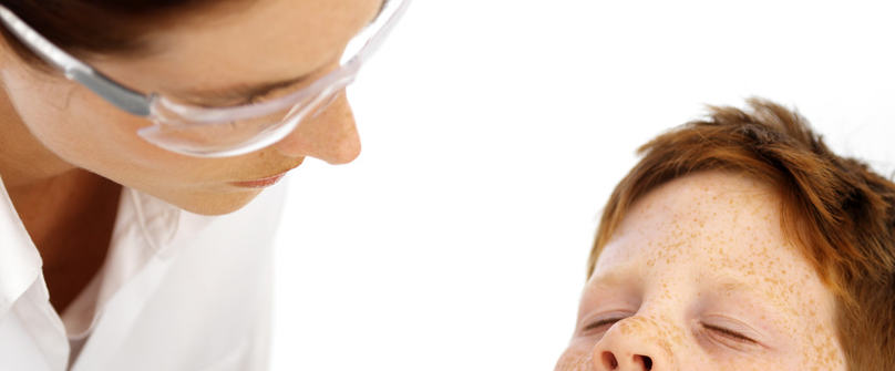 Dentist Examining Little Boys Teeth --- Image by © Royalty-Free/Corbis Dentist Examining Little Boys Teeth --- Image by © Royalty-Free/Corbis