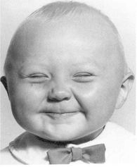 Trillroinnj blid liten gutt Smil til verden
