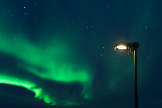 42969989-street-lamp-and-northern-lights