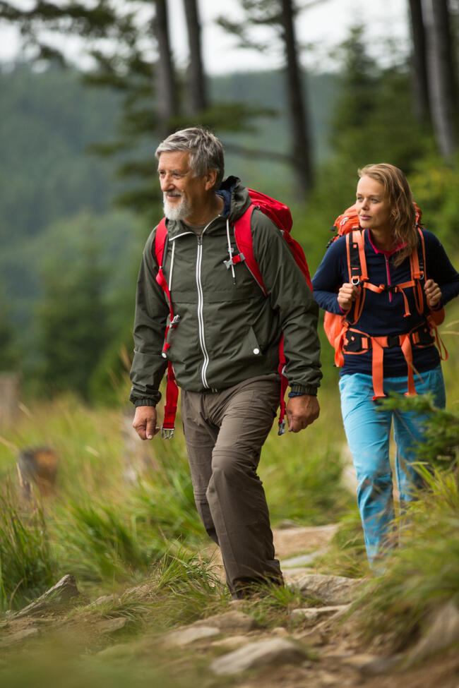 21563174-active-senior-hiking-in-high-mountains-with-his-daughter