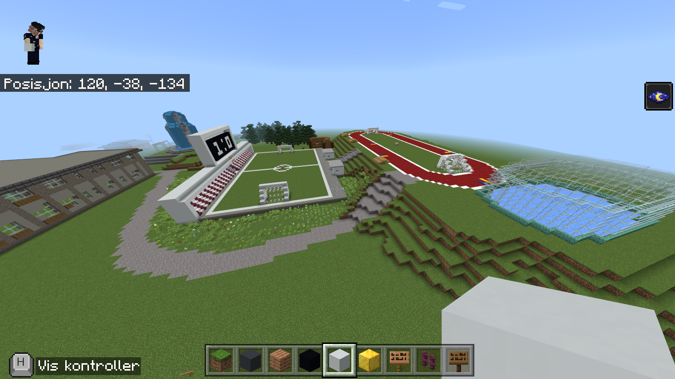 Skjermbilde fra Minecraft. Viser det nye fotballanlegget, løpebane og utendørs ishall.