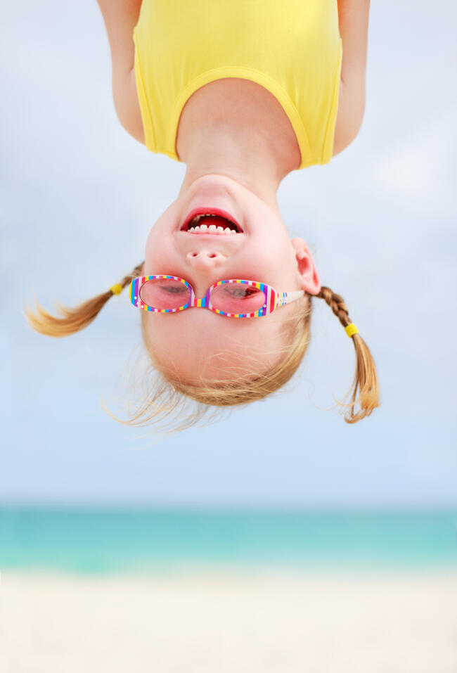 3167372-happy-little-girl-upside-down[1]