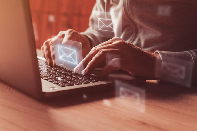 mp51871671-writing-e-mail-on-laptop-closeup-of-male-hands-typing